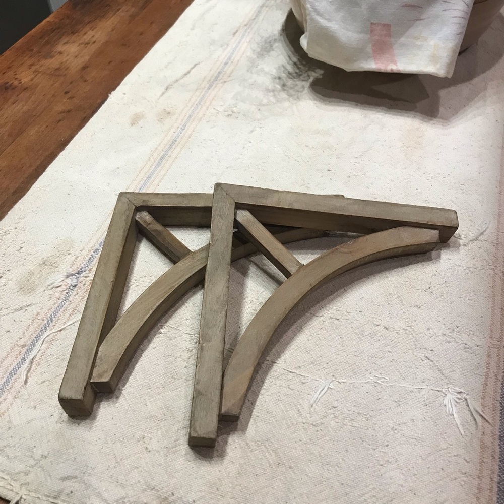 Lightly white washed corbels